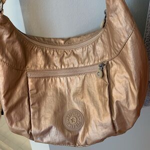 Kipling Hobo crossbody bag in Gold/Champagne Metallic Nylon material
